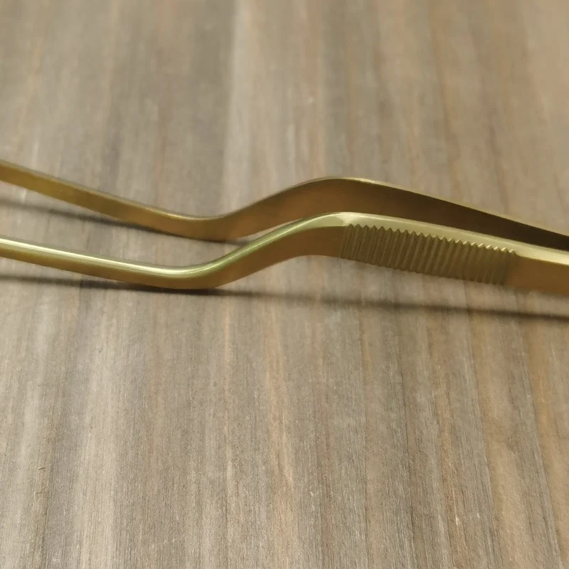 Pinza para emplatar Dorada