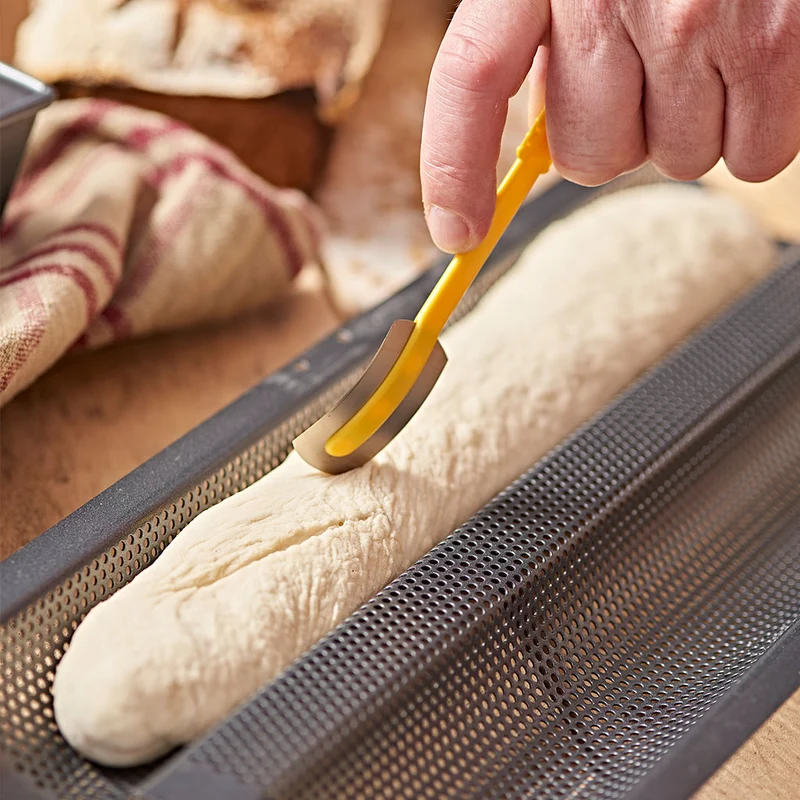 Bandeja antiadherente perforada para baguettes De Buyer