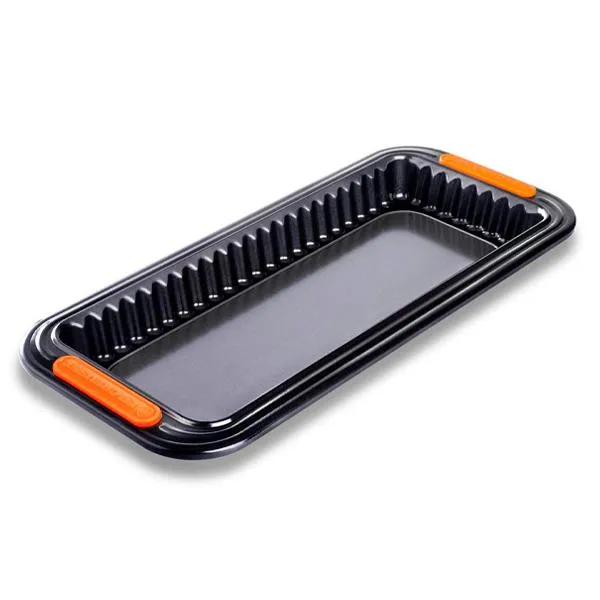 Molde rectangular antiadherente con base extraible Le Creuset